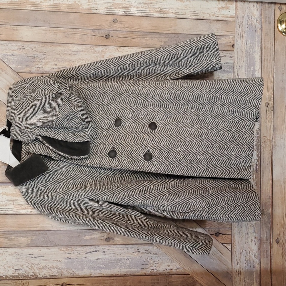 Vintage child handcrafted lined jacket with matching hat. In great condition.